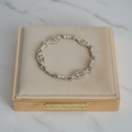 Pulsera Eslabones Ovalados Calados con Cruz