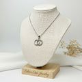 Collar Dos Aros Entrelazados con Zirconia
